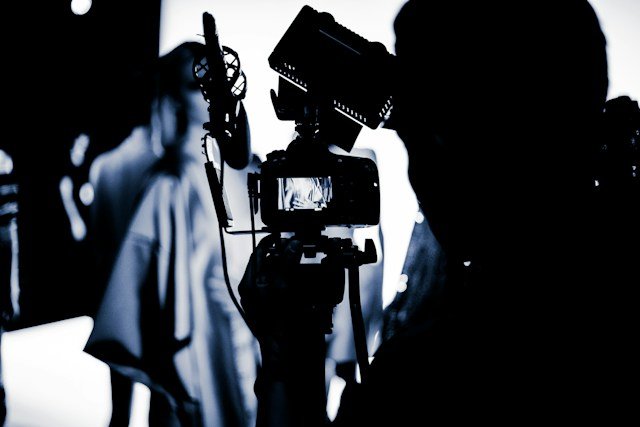 Professional photoshoot setup with lighting and equipment